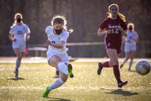 Thunder Mountain High School junior Kiah Dihle kicks the ball during a game against Ketchikan High School. (Courtesy Photo / Zach Hanna)