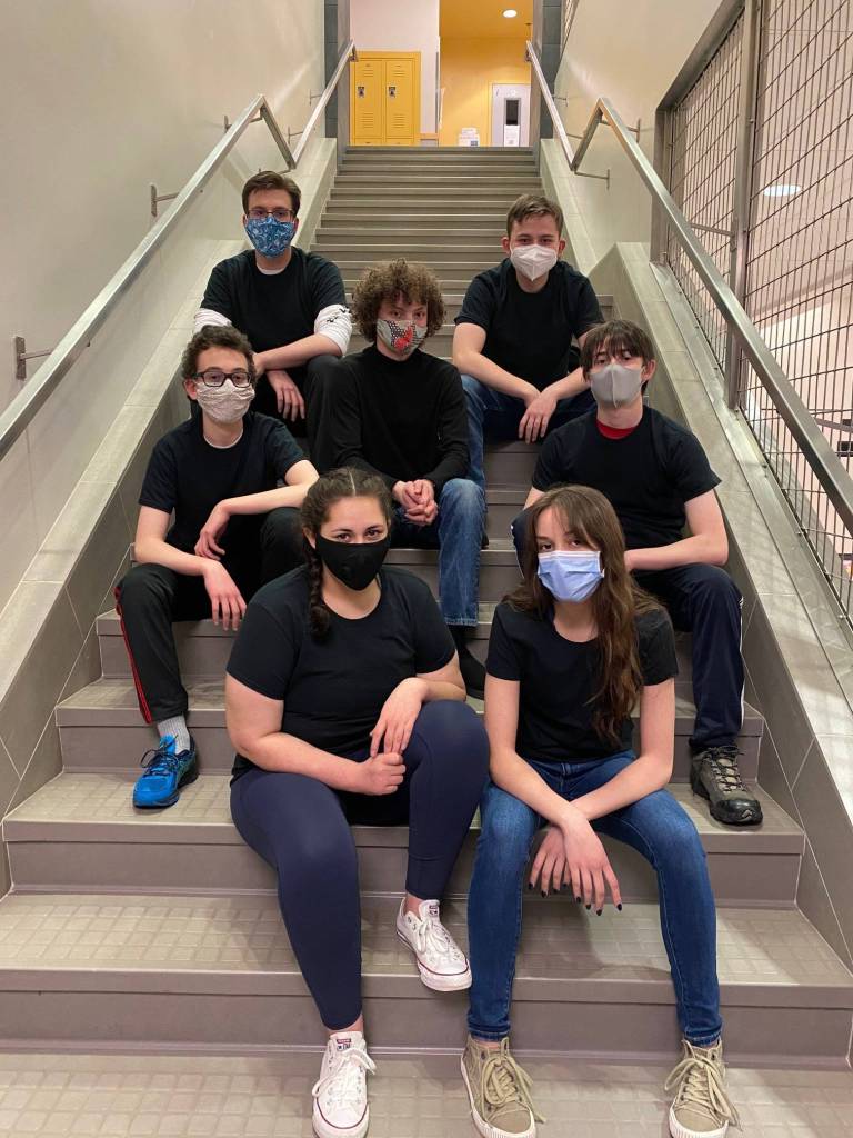 TMHS robotics team chain reaction pose together. The team, which consists of Keelan Cunningham and John Barnhill, both seniors; senior Remi Wiley; junior Hailee Cunningham; freshman Areo Meoli; junior Corrine Rather; and freshman Connor Greene; recently took top honors in the state robotics competition. (Courtesy Photo / Carol May)