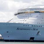 The Symphony of the Seas cruise ship is shown docked at PortMiami, in a Wednesday, May 20, 2020, photo, in Miami. Cruise lines can soon begin trial voyages in U.S. waters. Theyll have to carry some volunteer passengers, who will have to wear face masks and observe social distancing while on board. The Centers for Disease Control and Prevention gave ship operators final technical guidelines Wednesday, May 5, 2021 for the trial runs. (AP Photo / Wilfredo Lee)
