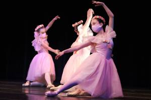 Kensey Jenkins (foreground, right) performs as a Lilac Fairy Attendant  during a rehearsal for Juneau Dance Theatre's "Spring Showcase" on Thursday, May 6. The showcase will be available to stream at certain times on May 14, 15 and 16. (Ben Hohenstatt / Juneau Empire)