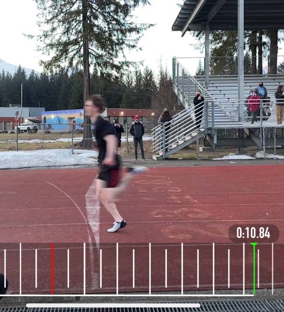 James Connally sprints past the finish in the 100 meter dash, setting what would become a school record for Juneau-Douglas High School: Yadaa.at Kalé. (Courtesy photo / Janette Gagnon)
