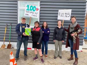 Courtesy Photo / Iola Young 
Marla Berg presents $22,750 in mattress money to the Glory Hall, recipient of this quarters 100+ Women Who Cares donation. Shown here (left to right): Bruce Denton, president of the Glory Hall Board of Directors; Marla Berg, member of 100+ Women Who Cares organizing team; Maria Lovishchuk, executive director of the Glory Hall; and Glory Hall board members Deb Maas and Jorden Nigro, who is also a member of 100+ Women. Nigro made the winning pitch to the giving circle that now numbers 279 members. When collection of each $100 donation is complete, the Glory Hall award will total $27,900. Enough to purchase all the beds, mattresses and locking trunks needed for the new facility.