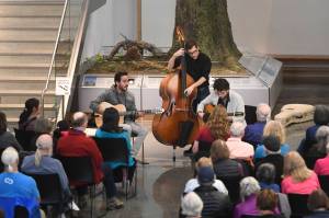 Members of the Gonzalo Bergara Trio perform in the atrium of the Andrew P. Kashevaroff Building as part of Juneau Jazz & Classics on Friday, May 10, 2019. The music festival continues through May 18. (Michael Penn | Juneau Empire)