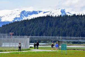 Juneauites walking the Airport Dike Trail, seen here on Tuesday, May 25, 2021, probably wont see the monitoring wells being installed in the area around the Juneau International Airport to test for contamination from per- and polyfluoroalkyl substances, commonly known as PFAS chemicals. Ground water testing is set to take place over the next few years. (Peter Segall / Juneau Empire)
