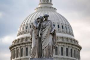 The Capitol Dome looms behind the Peace Monument statue in Washington, Friday, May 28, 2021, as the Senate tries to finish to its work going into the Memorial Day recess with Republican leaders insisting they will block a commission on the Jan. 6 insurrection by a mob loyal to former President Donald Trump. (AP Photo / J. Scott Applewhite)