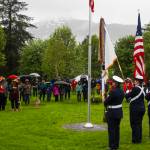 A Coast Guard color guard parades the colors at a Memorial Day ceremony held by the Veterans of Foreign Wars Post 5559 at Evergreen Cemetery on May 31, 2021. (Michael S. Lockett / Juneau Empire)