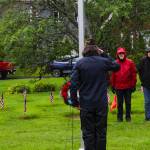Veterans of Foreign Wars Post 5559 quartermaster Dan McCrummen salutes the wreath laid at the foot of the flagpole during a Memorial Day ceremony at Evergreen Cemetery on May 31, 2021. (Michael S. Lockett / Juneau Empire)