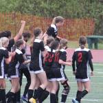 Members of the JDHS girls soccer team celebrate after clinching the state soccer title. The team capped a perfect season by besting the Soldotna Stars 5-1 to clinch the Division II title. (Courtesy Photo/Carolyn Kelley)