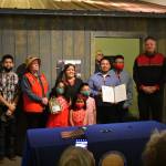 Martin Stepetin Sr. holds up a signed bill protecting a cemetery in Funter Bay at a ceremony with Gov. Mike Dunleavy and several lawmakers and community members at the Juneau-Douglas City Museum on Tuesday, June 8, 2021. (Peter Segall / Juneau Empire)