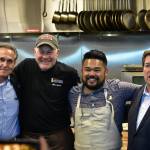 From left to right, Alaska Lt. Gov. Kevin Meyer, Chef Michael Brewer, Chef Lionel Uddipa and Louisiana Lt. Gov. Billy Nungesser in the kitchen of Red Spruce for a charity dinner highlighting the seafood cuisines of both states on Tuesday, June 8, 2021. (Peter Segall / Juneau Empire)