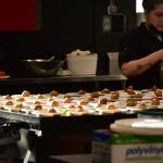 Red Spruce chefs prepare a dessert of New Orleans beignets with Alaskan foraged elderflower pastry cream, Alaskan devils club ice cream at a charity dinner highlighting Alaska and Louisiana seafood at Forbbiden Peak Brewery on Tuesday, June 8, 2021. (Peter Segall / Juneau Empire)