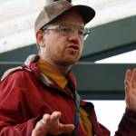 Bretwood Hig Higman, executive director of Ground Truth Trekking, talks Thursday at a news conference outside Dzantiki Heeni Middle School about the risk of an eventual landslide in the Lemon Creek area. (Ben Hohenstatt / Juneau Empire)