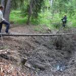 ason Clark, at left, a postdoctoral researcher at UAF, and Nicholas Hasson, a UAF graduate student, examine a sinkhole known as a thermokarst in a Fairbanks homeowner’s backyard. (Courtesy Photo / Ned Rozell)