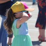 Caroline Wadlow, 6, reacts to the noise of a Coast Guard water rescue demonstration during the 11th edition of the Juneau Maritime Festival. (Ben Hohensatt / Juneau Empire)