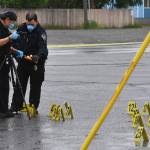 Police investigate the scene of an early morning fatal shooting along Gambell Street between Fourth Avenue and Fifth Avenue near downtown Anchorage, Alaska, Saturday, June 19, 2021. (Bill Roth / Anchorage Daily News)