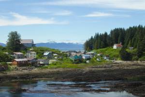 Angoon, seen in this Tuesday photo, is one of the nearly 200 communities across Alaska that are served by the Power Cost Equalization program, which reduces power coasts for rural customers. PCE is poised to be unfunded due to a bookkeeping mechanism known as the sweep. Legislative leaders have said they intend to vote on the reverse sweep, which would fund the PCE among other programs, during a special session in August. (Michael S. Lockett / Juneau Empire)