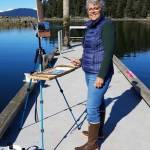 This undated photo shows local artist Christine Lewis painting en plein air. Lewis work will be featured at Juneau Artists Gallery for First Friday. (Courtesy Photo / Christine Lewis)