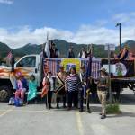 Marshals in the Juneau Fourth of July parade get ready for festivities on July 4, 2021. (Dana Zigmund / Juneau Empire)