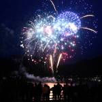 Fireworks light up the night sky over the Gastineau Channel with reds, whites and blues in the early hours of the Fourth of July. (Peter Segall / Juneau Empire)