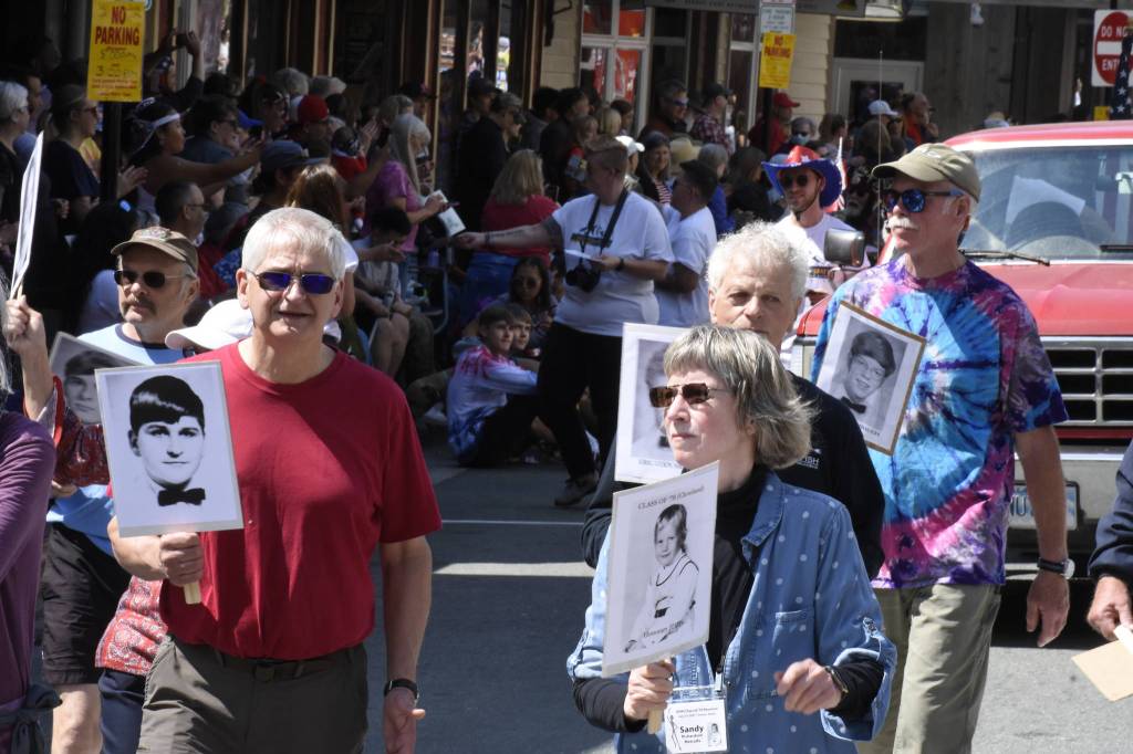 Members of the Juneau-Douglas High School class of 70 march in the Juneau Fourth of July parade. (Peter Segall / Juneau Empire)