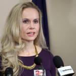 Then-Alaska Department of Administration Commissioner Kelly Tshibaka addresses reporters in Anchorage, Alaska. The leaders of Alaskas Republican Party endorsed Tshibaka in the 2022 race for the U.S. Senate seat held by incumbent Republican U.S. Sen. Lisa Murkowski. Murkowski hasnt officially announced her re-election plans but her campaign released fundraising details, Wednesday, July 14, 2021, that an advisor says strongly positions, a re-election bid by Murkowski. The campaign statement comes ahead of a filing deadline and days after Republican party leaders in Alaska endorsed Tshibaka. (AP Photo / Mark Thiessen)