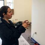 Glory Hall executive director Mariya Lovishchuk points out some of the new features of the new Glory Hall, located near the airport and set to open on Thursday, July 22, 2021. (Michael S. Lockett / Juneau Empire)