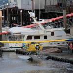 This Aug. 5, 2021, photo provided by Lee LaFollette shows a de Havilland Beaver aircraft departing the Port of Ketchikan, Alaska. Foggy, reduced-visibility conditions have delayed efforts to recover the wreckage of a sightseeing plane that crashed in southeast Alaska, killing six people. Clint Johnson, chief of the National Transportation Safety Board’s Alaska region, says the agency had hoped to recover the wreckage Sunday. But he says those efforts were called off due to poor conditions. He says the crew planned to try again on Monday, Aug. 9, 2021. (Lee LaFollette via AP)