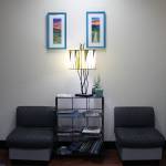 The waiting room at Custom Cuts II in the Jordan Creek Mall sits empty on Aug. 19. Beginning at 5 p.m. Friday, Aug. 20, new citywide COVID-19 mitigation measures mean that all personal services businesses must operate by appointment only and close all waiting areas. (Dana Zigmund / Juneau Empire)