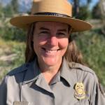 This Aug. 9, 2021 photo shows Chief Ranger Erika Jostad in Grand Teton National Park in Moose, Wyo. Erika Jostads baseline for what Grand Teton National Park is like in the summer, is skewed by 2021, easily the busiest year in the parks 92-year-and-running history. Teton Parks incoming permanent chief ranger has been in the job for months on an interim basis, during which time shes overseen some 60 incident responses to fire  and thats with a couple months of wildfire season remaining. The more general emergency call caseload has ballooned, too, outpacing gains in visitation and increasing nearly 70% over the average from the past five years.(Mike Koshmrl / Jackson Hole News & Guide)