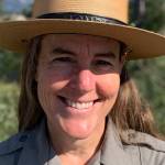 This Aug. 9, 2021 photo shows Chief Ranger Erika Jostad in Grand Teton National Park in Moose, Wyo. Erika Jostads baseline for what Grand Teton National Park is like in the summer, is skewed by 2021, easily the busiest year in the parks 92-year-and-running history. Teton Parks incoming permanent chief ranger has been in the job for months on an interim basis, during which time shes overseen some 60 incident responses to fire  and thats with a couple months of wildfire season remaining. The more general emergency call caseload has ballooned, too, outpacing gains in visitation and increasing nearly 70% over the average from the past five years.(Mike Koshmrl/Jackson Hole News & Guide)