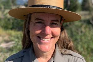 This Aug. 9, 2021 photo shows Chief Ranger Erika Jostad in Grand Teton National Park in Moose, Wyo. Erika Jostads baseline for what Grand Teton National Park is like in the summer, is skewed by 2021, easily the busiest year in the parks 92-year-and-running history. Teton Parks incoming permanent chief ranger has been in the job for months on an interim basis, during which time shes overseen some 60 incident responses to fire  and thats with a couple months of wildfire season remaining. The more general emergency call caseload has ballooned, too, outpacing gains in visitation and increasing nearly 70% over the average from the past five years.(Mike Koshmrl/Jackson Hole News & Guide)