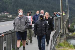 Juneau residents and veterans gathered on Tuesday, Aug. 24, 2021 for Together with Juneau Veterans first Walk with a Vet event across the Douglas Bridge. (Michael S. Lockett / Juneau Empire)