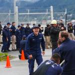 A petty officer exhorts his shipmates during the tug of war, one of the inter-vessel competitions during this years Buoy Tender Roundup at Sector Juneau, on Wednesday, Aug. 25, 2021. (Michael S. Lockett / Juneau Empire)