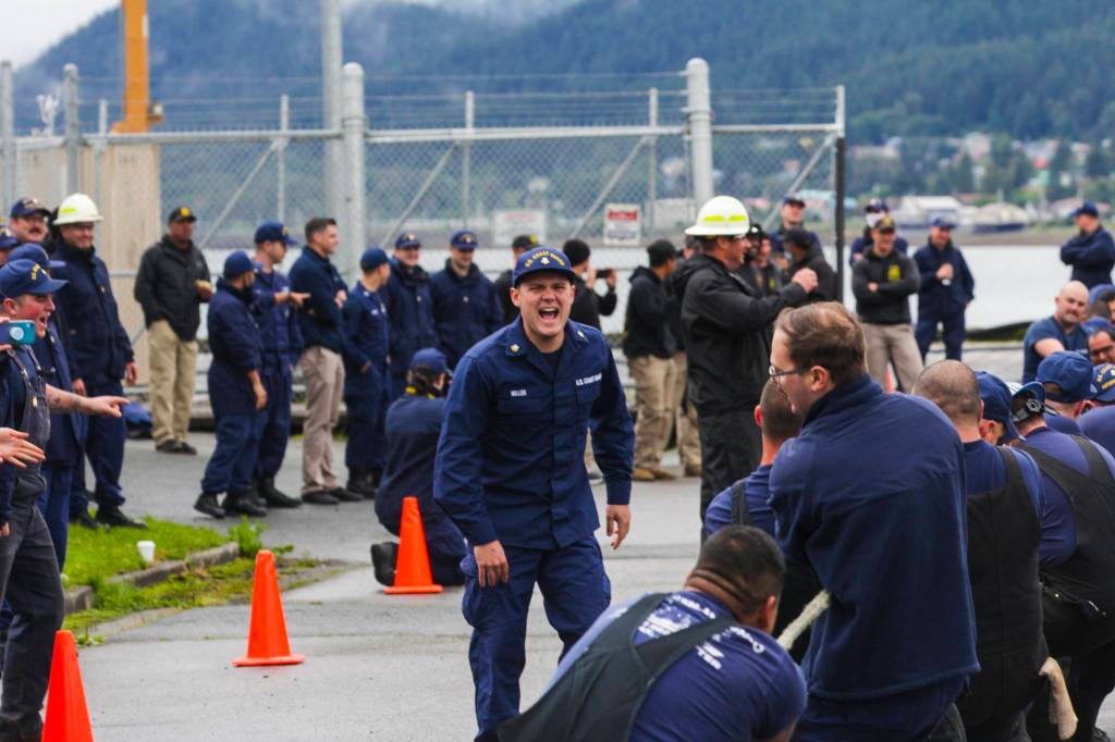 A petty officer exhorts his shipmates during the tug of war, one of the inter-vessel competitions during this years Buoy Tender Roundup at Sector Juneau, on Wednesday, Aug. 25, 2021. (Michael S. Lockett / Juneau Empire)