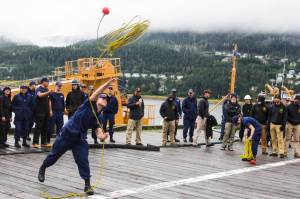 Petty Officer 1st Class Joseph Gauvain participates in the line toss, one of the inter-vessel competitions during this years Buoy Tender Roundup at Sector Juneau, on Wednesday, Aug. 25, 2021. (Michael S. Lockett / Juneau Empire)