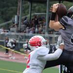 Juneaus Payton Grant, a junior, corrals the ball while leaping to secure a two-point conversion for the Huskies. Those two points gave Juneau a two-possession advantage. It was Juneaus second 2-point conversion of the game. Juneau Coach Rich Sjoroos called the play, which required some scrambling from senior quarterback Noah Chambers, the Huskies offensive play of the game. (Ben Hohenstatt / Juneau Empire)
