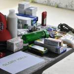 Items donated to the Juneau Central Labor Councils Labor Day donation drive at Saviko Park were sorted onto tables on Monday, Sept. 6, 2021, one table for each of the three organizations involved, the Glory Hall, Aware, and foster child programs. (Peter Segall / Juneau Empire)