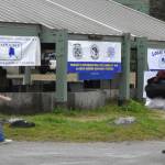 Unable to hold the usual Labor Day picnic, members of Juneau's Central Labor Council decided to hold a donation drive at Saviko Park instead. According to CLC President Kirk Perisich, seen here at right bringing donated clothes to be sorted on Monday, Sept. 6, 2021, donations had piled up within the first 20 minutes. (Peter Segall / Juneau Empire)