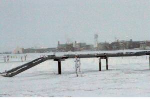 This Feb. 9, 2016, photo shows ice forming on pipelines built near the Colville-Delta 5 field, or as it's more commonly known, CD5, drilling site on Alaska's North Slope. The Trump administration will consider a new management plan and expanded oil drilling for the National Petroleum Reserve-Alaska, an Indiana-size area that former Interior Secretary Ken Salazar characterized as an "iconic place on our Earth." The Bureau of Land Management announced Thursday, Nov. 21, 2019, it will take public comment through Jan. 21 on four alternatives for the reserve in northern Alaska. (AP Photo / Mark Thiessen)