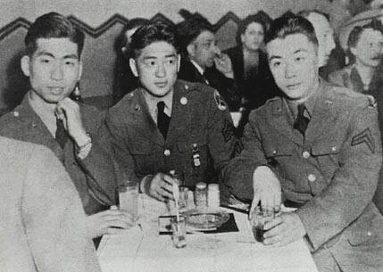 Courtesy Photo / Ronald Inouye Collection, University of Alaska Fairbanks 
From left to right, soldiers George Kimura, Sergeant Pat Hagiwara and Corporal Charlie Tatsuda, Japanese-Americans from Alaska sit in the Blackhawk Restaurant in Chicago, 1942.