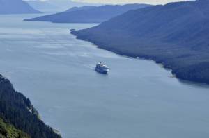 Sen. Lisa Murkowski, R-Alaska, introduced legislation to permanently exempt large ships from the Passenger Vessel Services Act, which threatened Alaska's cruise ship season this year. The PVSA puts regulations on large cruise ship vessels, like this one entering the Gastineau Channel on Aug. 22, which are critical to the local tourism industry. (Peter Segall / Juneau Empire)