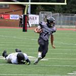 Ben Hohenstatt / Juneau Empire
Jamal Johnson, a junior, sheds a defender during a conference-clinching win on Saturday.