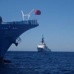 Crews aboard U.S. Coast Guard Cutter Bertholf prepare to board a fishing vessel flying the flag of the Peoples Republic of China in the North Pacific on Sep. 21, 2021. (Courtesy photo / U.S. Coast Guard)