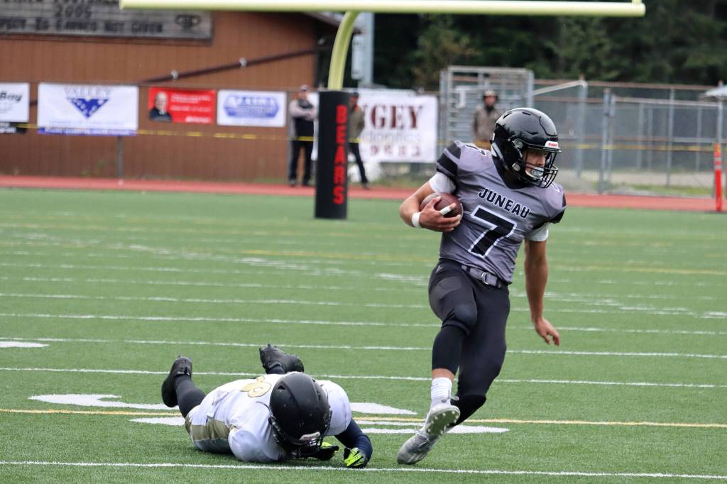 Jamal Johnson, a junior running back, finds himself in open space against South Anchorage High School. (Ben Hohenstatt / Juneau Empire)