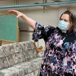 Pastor Karen Perkins of Resurrection Lutheran Church shows where the citys warming shelter would be sited if the churchs bid to host it is approved on Oct. 15, 2021. (Michael S. Lockett / Juneau Empire)