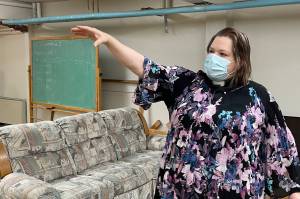 Pastor Karen Perkins of Resurrection Lutheran Church shows where the citys warming shelter would be sited if the churchs bid to host it is approved on Oct. 15, 2021. (Michael S. Lockett / Juneau Empire)