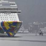 The last cruise ship of the year, the Norwegian Encore, sails out of Juneau on Wednesday, Oct., 20, 2021, ending a cruise ship season that almost didn't happen. According to the Juneau's Docks and Harbor's department, the Encore brought more than 2,000 passengers Wednesday, far below an average year. (Peter Segall / Juneau Empire)