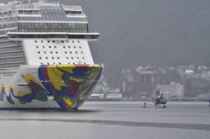 The last cruise ship of the year, the Norwegian Encore, sails out of Juneau on Wednesday, Oct., 20, 2021, ending a cruise ship season that almost didn't happen. According to the Juneau's Docks and Harbor's department, the Encore brought more than 2,000 passengers Wednesday, far below an average year. (Peter Segall / Juneau Empire)