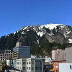 Mount Juneau, looms above downtown Juneau in this April 2021 photo. (Peter Segall / Juneau Empire File)