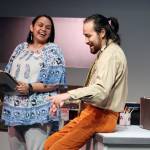 Sarah (Erin Tripp) and Carl (Jared Olin) laugh while working on the Voyager project during a dress rehearsal for Perseverance Theatre's "Voyager One." The play, which is running now, is simultaneously two period pieces. One is set in the '70s, the other is in the distant future. (Ben Hohenstatt / Juneau Empire)